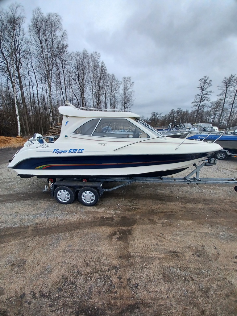Flipper 630cc -05 + Johnsson 140 hp 4t -05 + 1600kg trailer -85