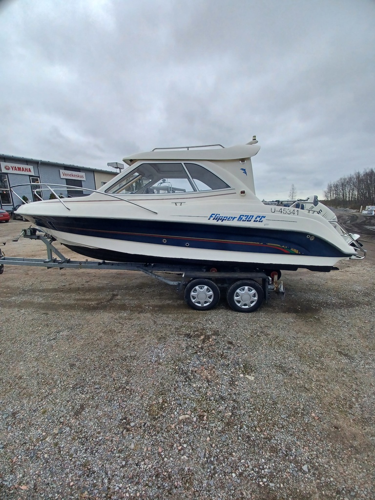 Flipper 630cc -05 + Johnsson 140 hp 4t -05 + 1600kg trailer -85