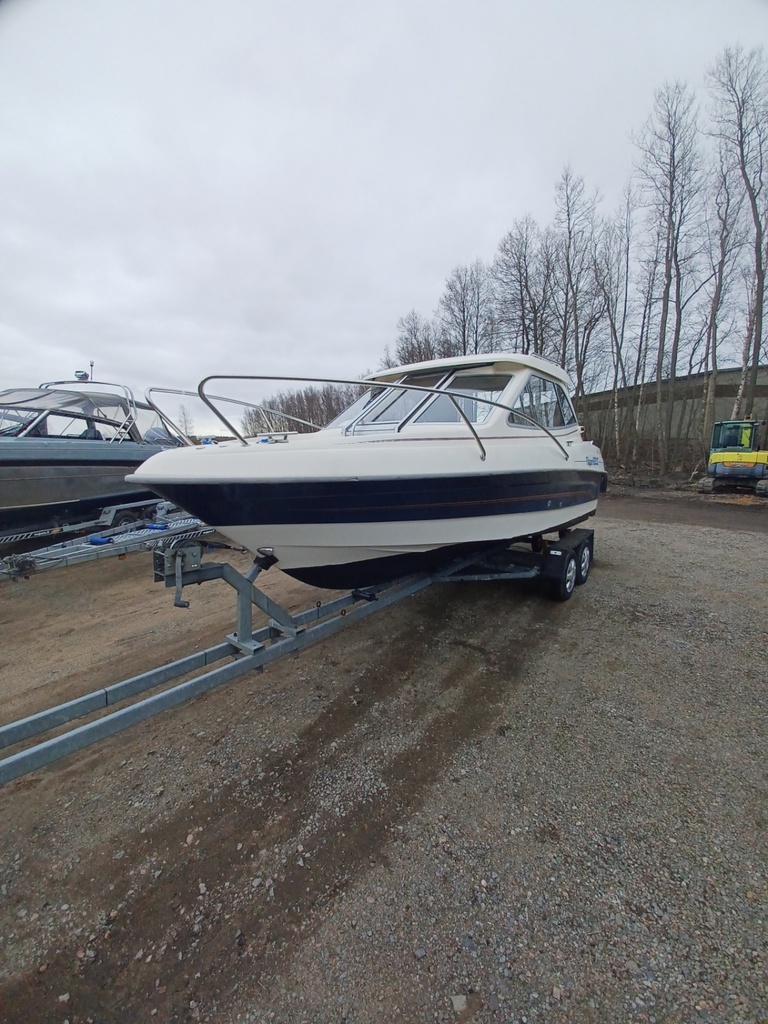 Flipper 630cc -05 + Johnsson 140 hp 4t -05 + 1600kg trailer -85